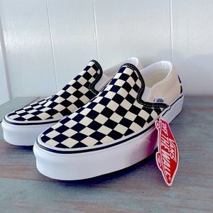 Checkered Vans slip-on shoes